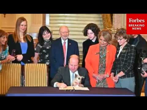 Colorado Gov. Jared Polis Holds Adorable Pet Adoption Event At Capitol, Signs Animal Protection Bill